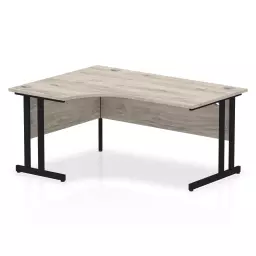 Dynamic Impulse W1600 x D1200/800 x H730mm Left Hand Crescent Desk With Cable Management Ports Cantilever Leg Grey Oak Finish Black Frame - MI003353